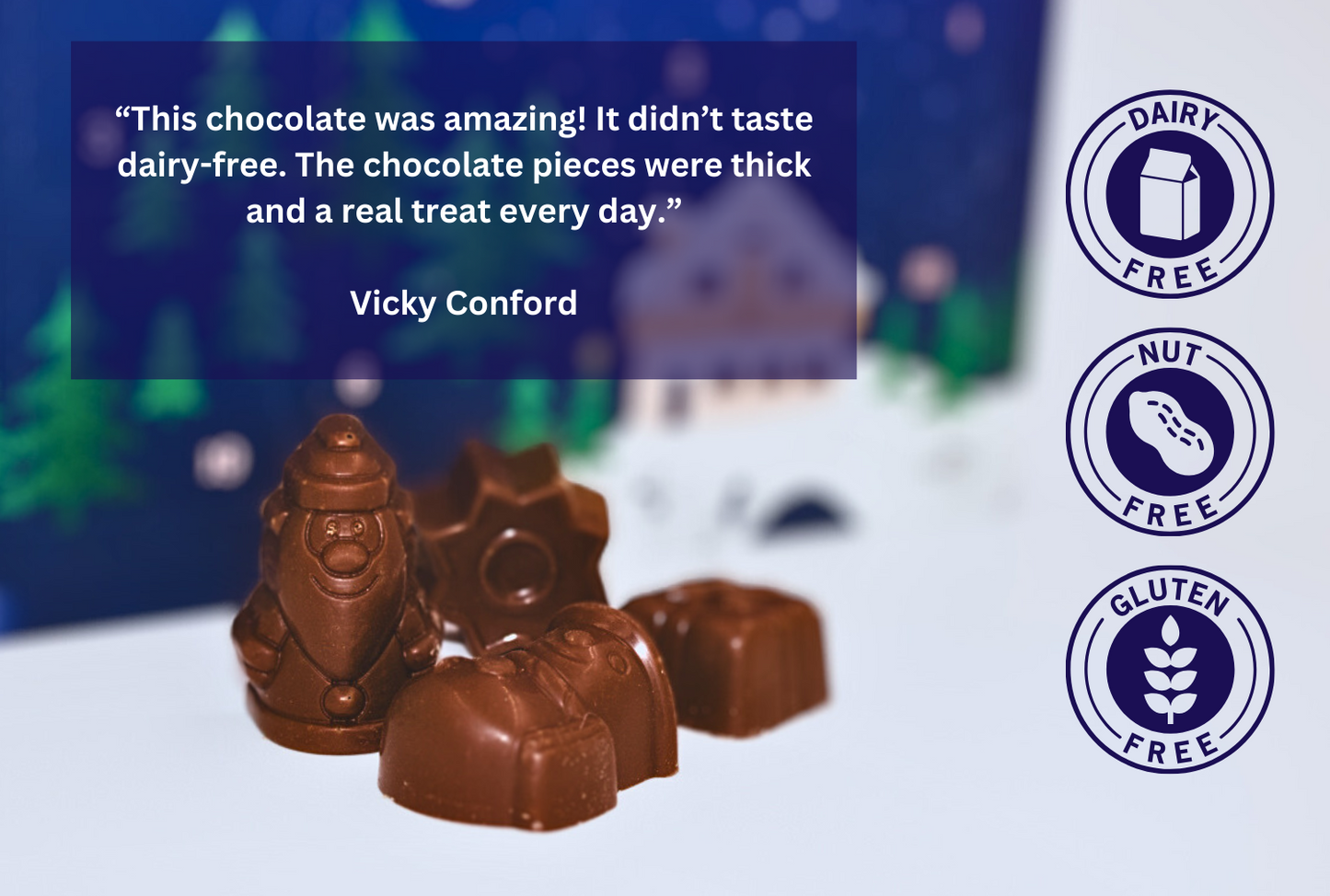 Various vegan chocolate shapes with the vegan, dairy free advent calendar in the background.